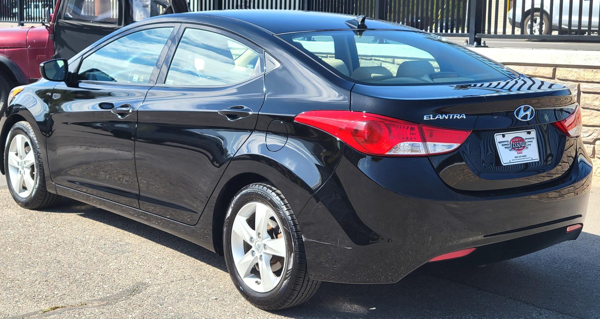 2013 Black /Tan Hyundai Elantra GLS (KMHDH4AE8DU) with an 1.8L I4 engine, 6 Speed Auto transmission, located at 450 N Russell, Missoula, MT, 59801, (406) 543-6600, 46.874496, -114.017433 - Low Mile Front Wheel Drive Sedan. One Owner. Excellent Fuel Economy. 1.8L I4 Engine. 6 Speed Automatic Transmission. AirConditioning. Power Windows and Locks. Bluetooth. - Photo#7